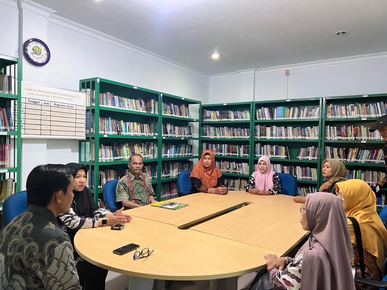 Kunjungan Tim UPA Perpustakaan Universitas Riau